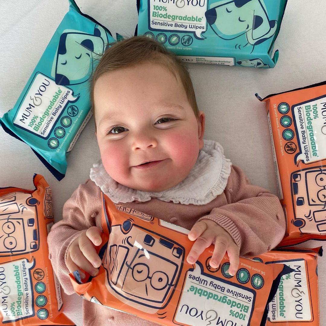 baby holding mum & you baby wipes